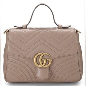 Gucci
GG Marmont Top Handle Flap Bag Matelasse
Leather